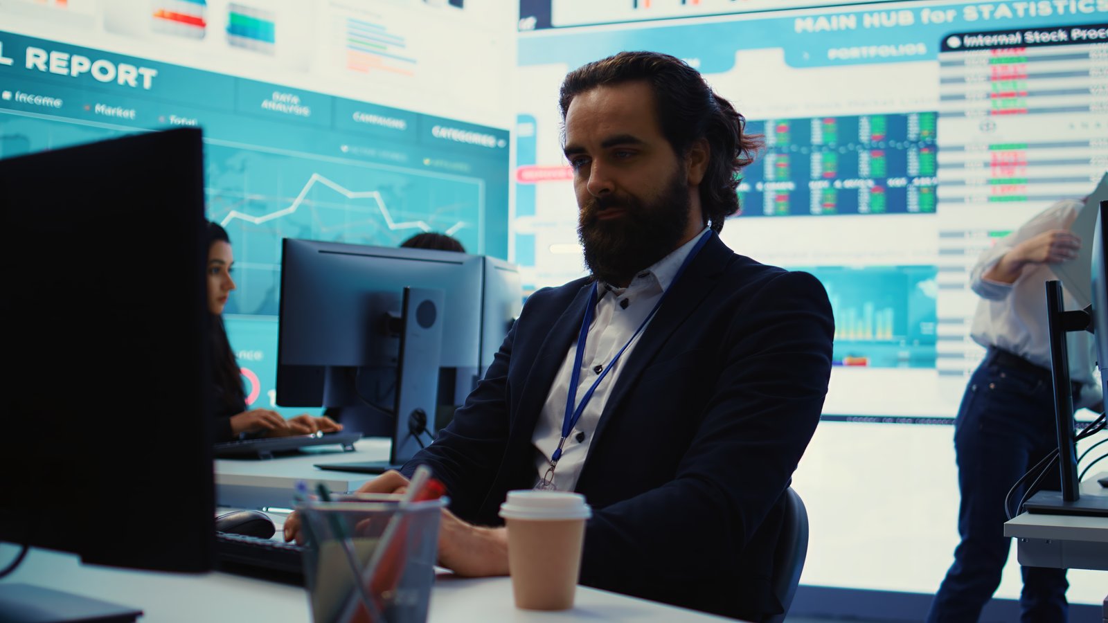 Business professionals working in a modern tech office